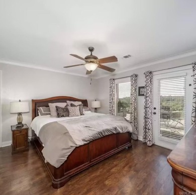 Spectacular 2-bed, 2-bath residence with gorgeous lake and on Diamondhead Golf and Country Club in Arkansas - for sale on GolfHomes.com, golf home, golf lot