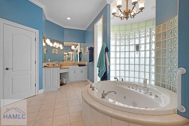 Welcome to this exquisite 4,400 sq ft custom stucco residence on Pine Forest Country Club in Georgia - for sale on GolfHomes.com, golf home, golf lot