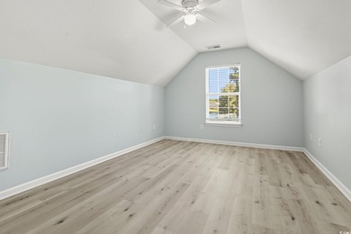 Welcome to this beautifully updated 4-bedroom, 3-bathroom home on Burning Ridge Golf Course in South Carolina - for sale on GolfHomes.com, golf home, golf lot