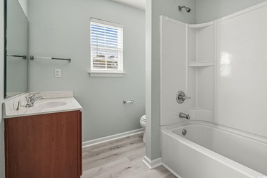 Welcome to this beautifully updated 4-bedroom, 3-bathroom home on Burning Ridge Golf Course in South Carolina - for sale on GolfHomes.com, golf home, golf lot