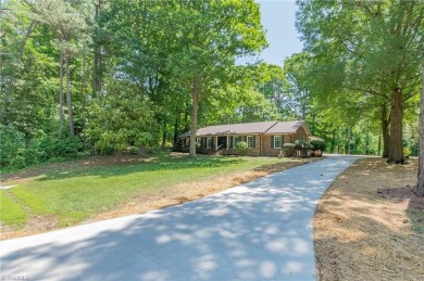 Beautifully updated home in Colonial Country Club blends modern on Colonial Country Club in North Carolina - for sale on GolfHomes.com, golf home, golf lot