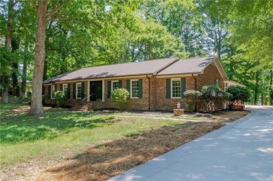 Beautifully updated home in Colonial Country Club blends modern on Colonial Country Club in North Carolina - for sale on GolfHomes.com, golf home, golf lot