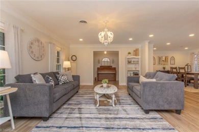 Beautifully updated home in Colonial Country Club blends modern on Colonial Country Club in North Carolina - for sale on GolfHomes.com, golf home, golf lot