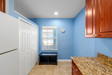 Welcome to this beautifully maintained 2-bedroom, 2-bathroom on Sabal Trace Golf and Country Club in Florida - for sale on GolfHomes.com, golf home, golf lot