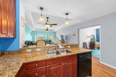 Welcome to this beautifully maintained 2-bedroom, 2-bathroom on Sabal Trace Golf and Country Club in Florida - for sale on GolfHomes.com, golf home, golf lot
