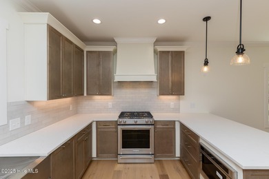 Welcome to your dream home in the premier lake and golf on Beacon Ridge Golf and Country Club in North Carolina - for sale on GolfHomes.com, golf home, golf lot