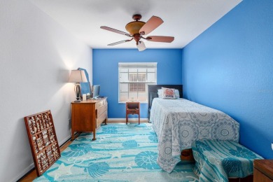 Welcome to this beautifully maintained 2-bedroom, 2-bathroom on Sabal Trace Golf and Country Club in Florida - for sale on GolfHomes.com, golf home, golf lot