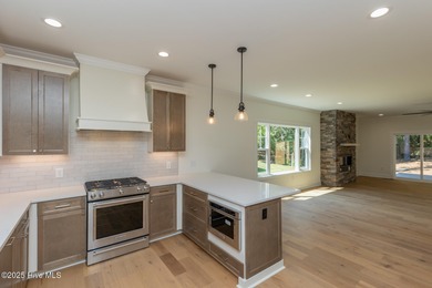 Welcome to your dream home in the premier lake and golf on Beacon Ridge Golf and Country Club in North Carolina - for sale on GolfHomes.com, golf home, golf lot