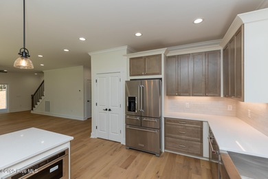 Welcome to your dream home in the premier lake and golf on Beacon Ridge Golf and Country Club in North Carolina - for sale on GolfHomes.com, golf home, golf lot