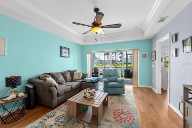 Welcome to this beautifully maintained 2-bedroom, 2-bathroom on Sabal Trace Golf and Country Club in Florida - for sale on GolfHomes.com, golf home, golf lot