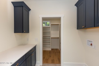 Welcome to your dream home in the premier lake and golf on Beacon Ridge Golf and Country Club in North Carolina - for sale on GolfHomes.com, golf home, golf lot