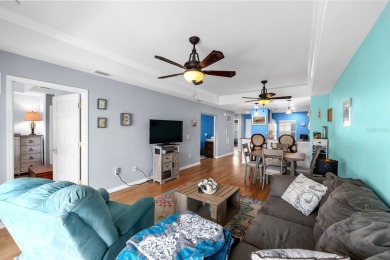 Welcome to this beautifully maintained 2-bedroom, 2-bathroom on Sabal Trace Golf and Country Club in Florida - for sale on GolfHomes.com, golf home, golf lot