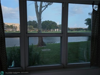 LOCATION,LOCATION, BEAUTIFUL TWO BEDROOM TWO BATH OVERLOOKING on Pine Island Ridge Country Club in Florida - for sale on GolfHomes.com, golf home, golf lot