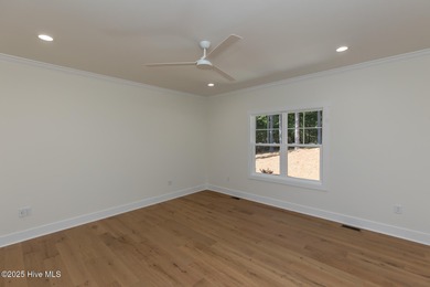 Welcome to your dream home in the premier lake and golf on Beacon Ridge Golf and Country Club in North Carolina - for sale on GolfHomes.com, golf home, golf lot