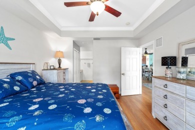 Welcome to this beautifully maintained 2-bedroom, 2-bathroom on Sabal Trace Golf and Country Club in Florida - for sale on GolfHomes.com, golf home, golf lot
