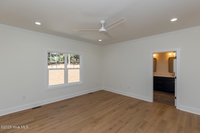 Welcome to your dream home in the premier lake and golf on Beacon Ridge Golf and Country Club in North Carolina - for sale on GolfHomes.com, golf home, golf lot