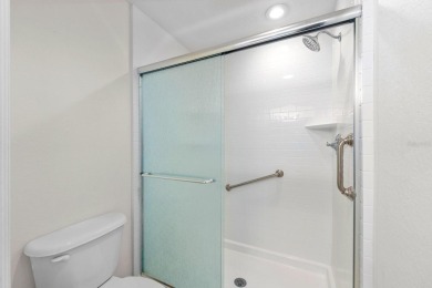 Welcome to this beautifully maintained 2-bedroom, 2-bathroom on Sabal Trace Golf and Country Club in Florida - for sale on GolfHomes.com, golf home, golf lot