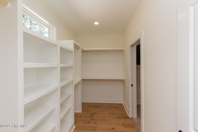 Welcome to your dream home in the premier lake and golf on Beacon Ridge Golf and Country Club in North Carolina - for sale on GolfHomes.com, golf home, golf lot