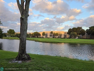 LOCATION,LOCATION, BEAUTIFUL TWO BEDROOM TWO BATH OVERLOOKING on Pine Island Ridge Country Club in Florida - for sale on GolfHomes.com, golf home, golf lot