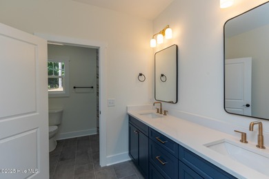 Welcome to your dream home in the premier lake and golf on Beacon Ridge Golf and Country Club in North Carolina - for sale on GolfHomes.com, golf home, golf lot