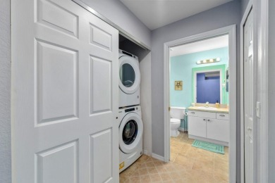 Welcome to this beautifully maintained 2-bedroom, 2-bathroom on Sabal Trace Golf and Country Club in Florida - for sale on GolfHomes.com, golf home, golf lot