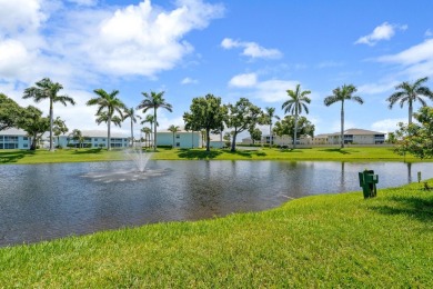 Welcome to this beautifully maintained 2-bedroom, 2-bathroom on Sabal Trace Golf and Country Club in Florida - for sale on GolfHomes.com, golf home, golf lot
