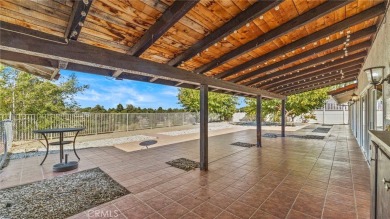 Stunning Spanish-Style Single-Story Home on a Premium Golf on Green Tree Golf Course in California - for sale on GolfHomes.com, golf home, golf lot