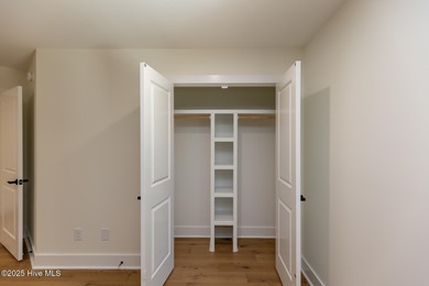 Welcome to your dream home in the premier lake and golf on Beacon Ridge Golf and Country Club in North Carolina - for sale on GolfHomes.com, golf home, golf lot