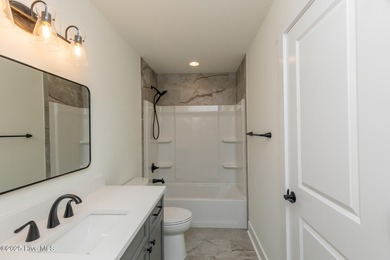 Welcome to your dream home in the premier lake and golf on Beacon Ridge Golf and Country Club in North Carolina - for sale on GolfHomes.com, golf home, golf lot