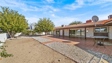 Stunning Spanish-Style Single-Story Home on a Premium Golf on Green Tree Golf Course in California - for sale on GolfHomes.com, golf home, golf lot