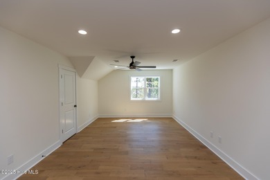 Welcome to your dream home in the premier lake and golf on Beacon Ridge Golf and Country Club in North Carolina - for sale on GolfHomes.com, golf home, golf lot