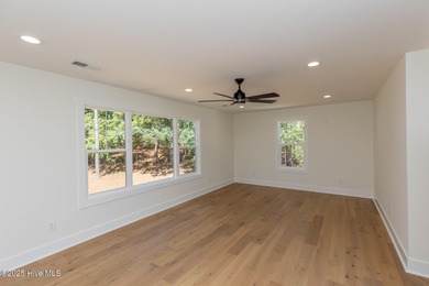 Welcome to your dream home in the premier lake and golf on Beacon Ridge Golf and Country Club in North Carolina - for sale on GolfHomes.com, golf home, golf lot