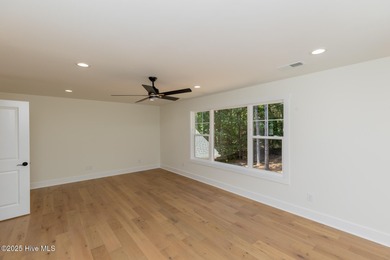 Welcome to your dream home in the premier lake and golf on Beacon Ridge Golf and Country Club in North Carolina - for sale on GolfHomes.com, golf home, golf lot