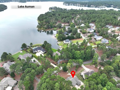 Welcome to your dream home in the premier lake and golf on Beacon Ridge Golf and Country Club in North Carolina - for sale on GolfHomes.com, golf home, golf lot