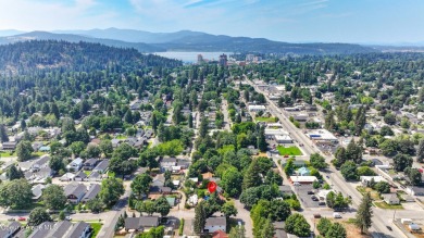 This charming home seamlessly blends classic character with on Coeur D Alene Resort Golf Course in Idaho - for sale on GolfHomes.com, golf home, golf lot