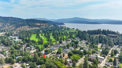 This charming home seamlessly blends classic character with on Coeur D Alene Resort Golf Course in Idaho - for sale on GolfHomes.com, golf home, golf lot