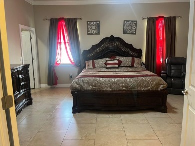 PRICE JUST REDUCED! Welcome to an impeccably maintained modern on Babe Zaharias Golf Course in Florida - for sale on GolfHomes.com, golf home, golf lot