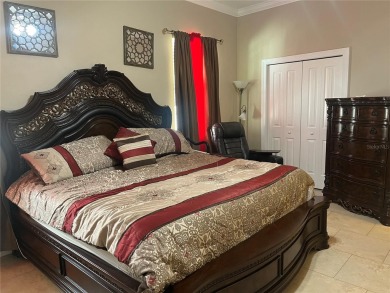 PRICE JUST REDUCED! Welcome to an impeccably maintained modern on Babe Zaharias Golf Course in Florida - for sale on GolfHomes.com, golf home, golf lot