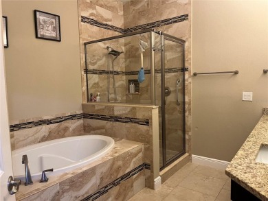 PRICE JUST REDUCED! Welcome to an impeccably maintained modern on Babe Zaharias Golf Course in Florida - for sale on GolfHomes.com, golf home, golf lot