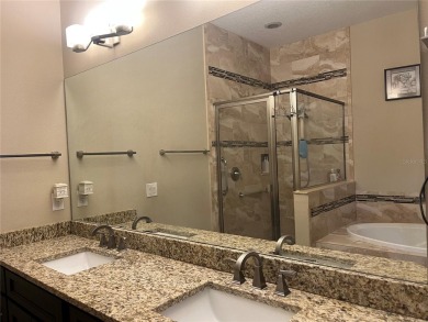 PRICE JUST REDUCED! Welcome to an impeccably maintained modern on Babe Zaharias Golf Course in Florida - for sale on GolfHomes.com, golf home, golf lot