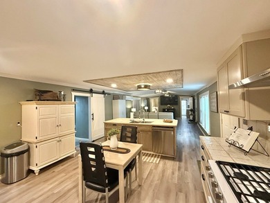 This stunning 2-bedroom, 2-bath partially furnished manufactured on Pendleton Harbor in Texas - for sale on GolfHomes.com, golf home, golf lot