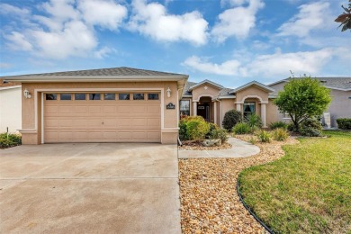 This home is a lovely Saint Augustine model with a few custom on Summerglen Country Club in Florida - for sale on GolfHomes.com, golf home, golf lot