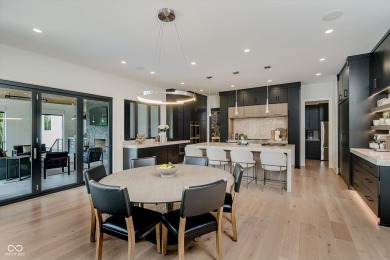 Step into luxury in this stunning Carrington Homes custom estate on Chatham Hills Golf Course in Indiana - for sale on GolfHomes.com, golf home, golf lot