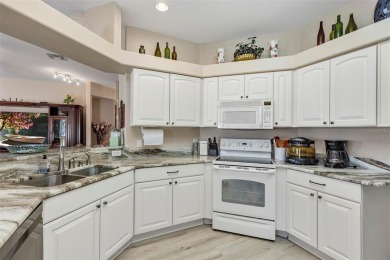 This home is a lovely Saint Augustine model with a few custom on Summerglen Country Club in Florida - for sale on GolfHomes.com, golf home, golf lot