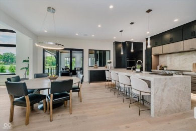Step into luxury in this stunning Carrington Homes custom estate on Chatham Hills Golf Course in Indiana - for sale on GolfHomes.com, golf home, golf lot