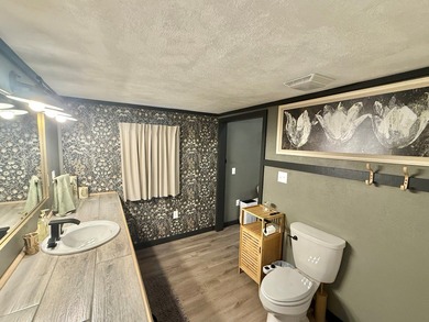 This stunning 2-bedroom, 2-bath partially furnished manufactured on Pendleton Harbor in Texas - for sale on GolfHomes.com, golf home, golf lot