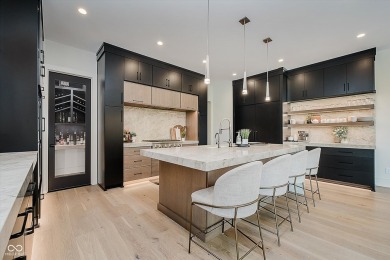 Step into luxury in this stunning Carrington Homes custom estate on Chatham Hills Golf Course in Indiana - for sale on GolfHomes.com, golf home, golf lot