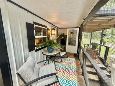 This stunning 2-bedroom, 2-bath partially furnished manufactured on Pendleton Harbor in Texas - for sale on GolfHomes.com, golf home, golf lot