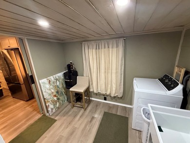 This stunning 2-bedroom, 2-bath partially furnished manufactured on Pendleton Harbor in Texas - for sale on GolfHomes.com, golf home, golf lot