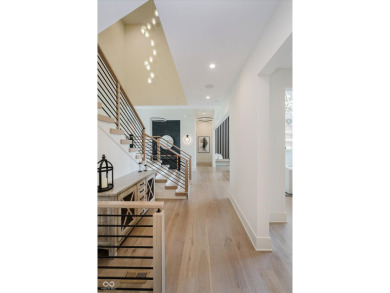 Step into luxury in this stunning Carrington Homes custom estate on Chatham Hills Golf Course in Indiana - for sale on GolfHomes.com, golf home, golf lot